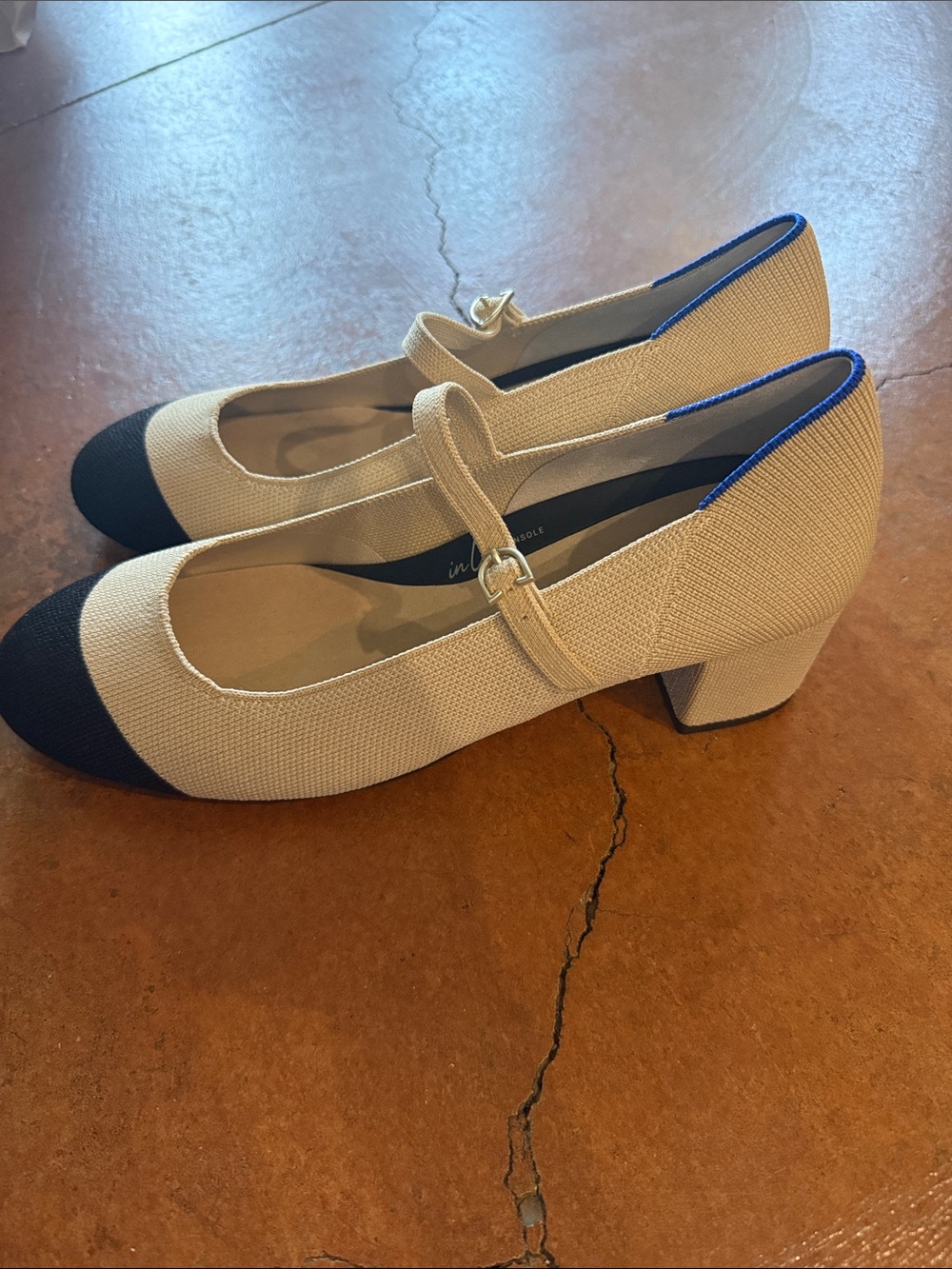 New Rothy’s Beige and Black Mary Jane Pumps